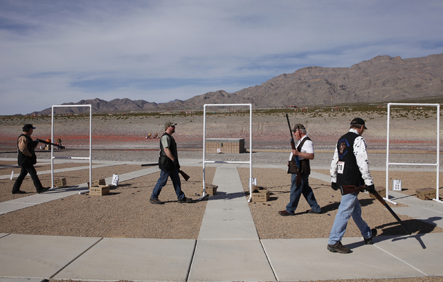 People take part in a Ducks Unlimited shooting event at the Clark County Shooting Complex in Las Vegas Thursday, Feb. 20, 2014. (John Locher/Las Vegas Review-Journal)
