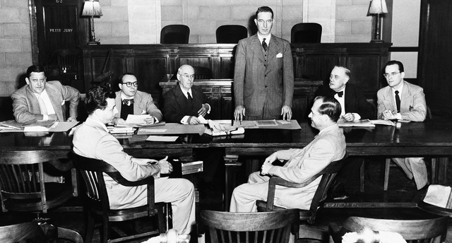 Sen. Estes Kefauver, D-Tenn., standing, chairman of Senate Crime Investigating Commission, open ...