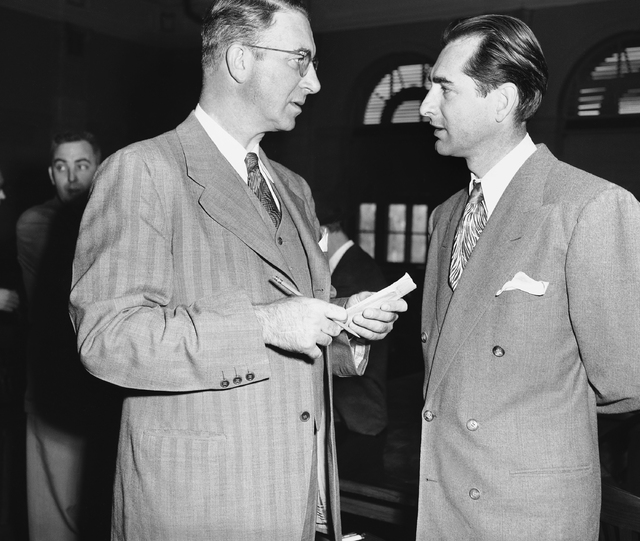 Sen. Estes Kefauver (D-Tenn), left, talks with the lieutenant governor of Nevada, Cliff Jones d ...