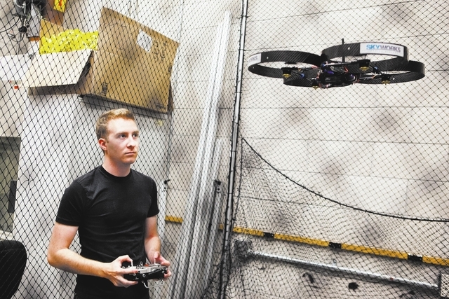 UNLV mechanical engineering senior Greg Friesmuth operates an unmanned aerial system, otherwise known as a drone, in a lab at the Thomas Beam Engineering Complex on the campus of the University of ...