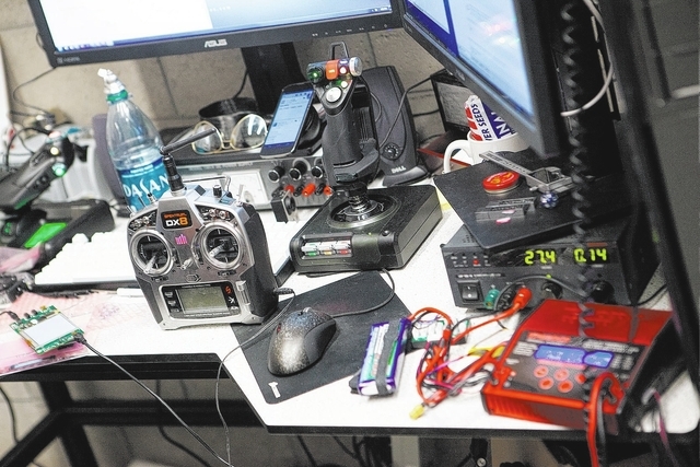 The controls for an unmanned aerial system, otherwise known as a drone, are seen, left, in a lab at the Thomas Beam Engineering Complex on the campus of the University of Nevada, Las Vegas on Mond ...