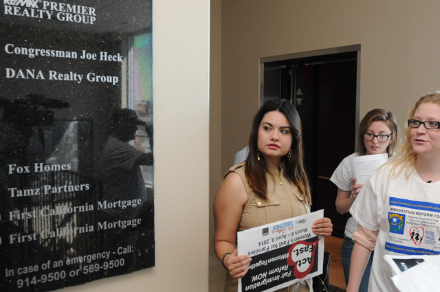 Immigration Reform for Nevada supporters Vanessa Becerra-Bautista, from left, Katelyn Franklin, and Emily Ross, are seen during a fasting event as they walk toward the office of U.S. Rep. Joe Heck ...