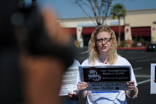 Emily Ross, spokeswoman with Immigration Reform for Nevada, gives a speech to the media during a fasting event outside of the office of U.S. Rep. Joe Heck, R-Nev., in protest of the Congress not t ...