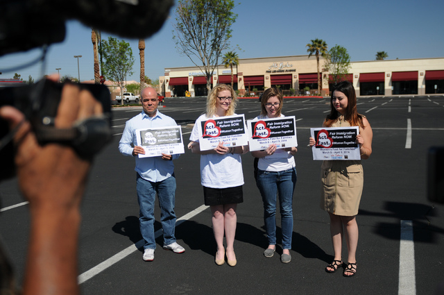 Immigration Reform for Nevada supporters Robert Telles, from left, Emily Ross, Katelyn Franklin and Vanessa Becerra-Bautista, are interviewed during a fasting event outside of the office of U.S. R ...