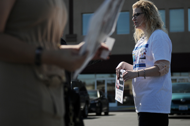 Emily Ross, spokeswoman with Immigration Reform for Nevada, is interviewed during a fasting event outside of the office of U.S. Rep. Joe Heck, R-Nev., in protest of the Congress not taking action ...