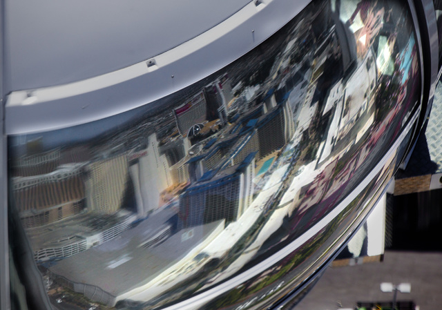 The Las Vegas Strip reflects from the High Roller pod  at The Linq as seen Monday, March 31, 2014. TThe world's tallest observation wheel opened to the public today.(Jeff Scheid/Las Vegas Review-J ...
