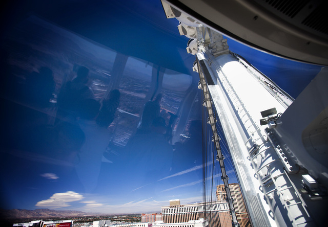 A reflection of people as seen Monday, March 31, 2014 while riding the High Roller at The Linq. The world's tallest observation wheel opened to the public today.(Jeff Scheid/Las Vegas Review-Journal)