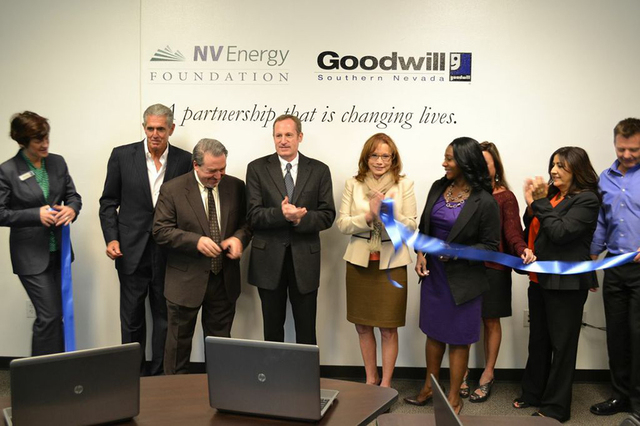 Tony Sanchez, NV Energy Senior Vice President of Government and Community Strategy cuts the ribbon for the new Imagine Room, a computer training room, at Goodwill of Southern Nevada’s North Las  ...