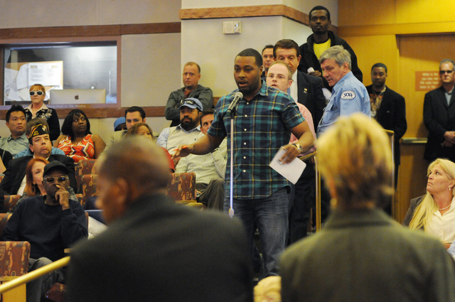 Devin Brooks asks a question during a public meeting on a new ordinance that would allow dispensaries for medical marijuana in Clark County at the Clark County Government Center in Las Vegas Wedne ...