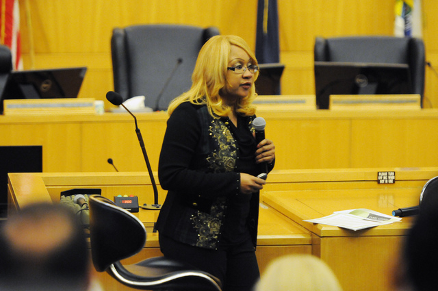 Jacqueline R. Holloway, director at Clark County Business License department, speaks about the licensing process during a public meeting on a new ordinance that would allow dispensaries for medica ...