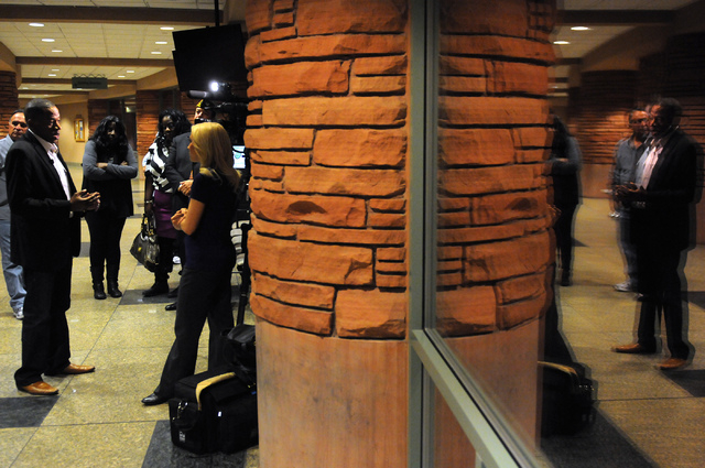 Clark County Commissioner Lawrence Weekly, left, is interviewed following a public meeting on a new ordinance that would allow dispensaries for medical marijuana in Clark County at the Clark Count ...