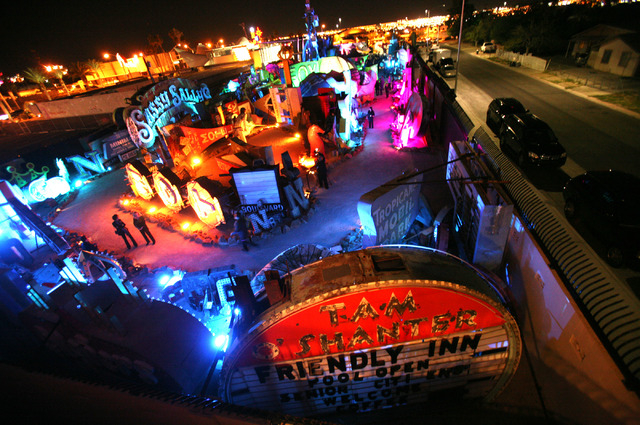 People walk through the Neon Museum at 770 Las Vegas Boulevard during the Grand Lighting ceremony Tuesday, Oct. 23, 2012. In 2013, the first full year of operation, the museum and the Neon Boneyar ...