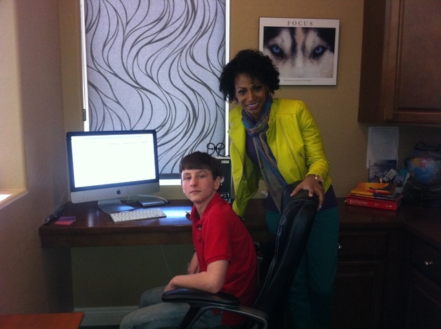 Devon Kisfalvi and Tonya Strozier are shown at Devon's home at his work station. At Nevada Connections Academy, Devon can work at his own pace. (Michael Lyle/ Las Vegas Review-Journal)