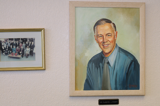 A painting of Clarence A. Piggott is seen at the entrance of the elementary school named for him. The portrait was given to the school as a gift for its 1993 opening. (Erik Verduzco/View)