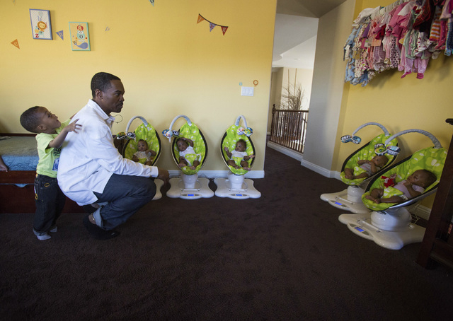 Deon Derrico with six of his nine children at their home in North Las Vegas on Monday, March 24, 2014. His wife Evonne Derrico gave birth to quintuplets on Sept. 6.(Jeff Scheid/Las Vegas Review-Jo ...