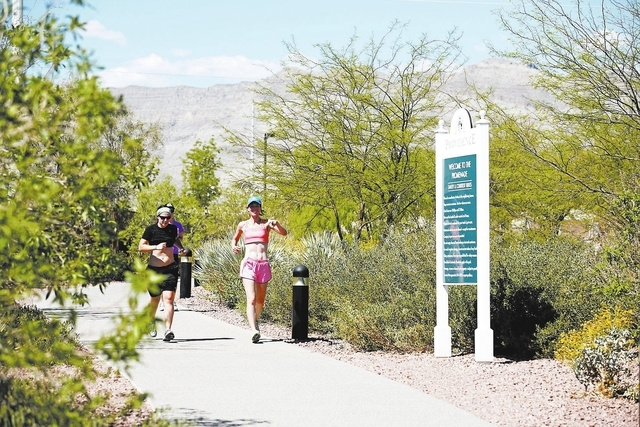 Courtesy photo Providence residents jog on one of the North Las Vegas master-planned community’s trails.