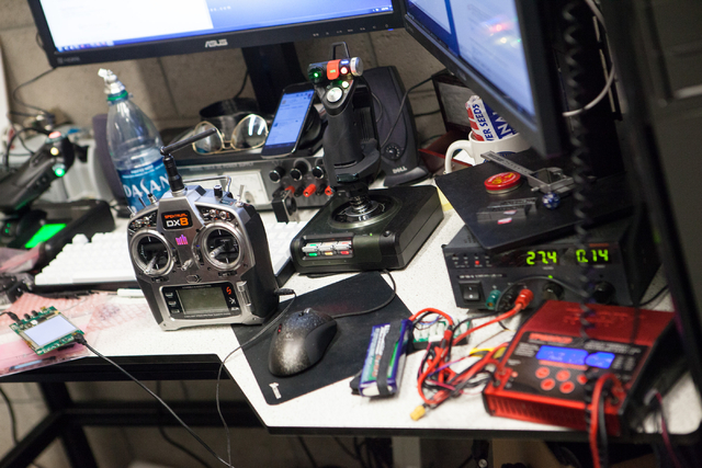 The controls for an unmanned aerial system, otherwise known as a drone, are seen, left, in a lab at the Thomas Beam Engineering Complex on the campus of the University of Nevada, Las Vegas on Mond ...