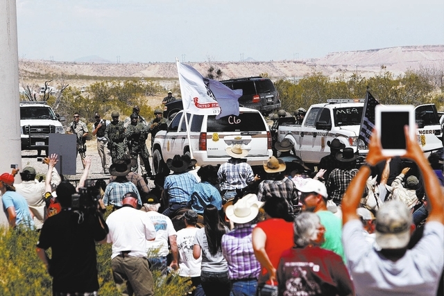 The Bundy family and their supporters gather together under the I-15 highway just outside of Bunkerville in order to confront the BLM and demand the release of their impounded cattle on April 12,  ...