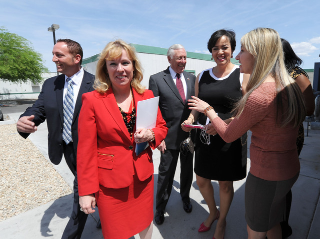 Nevada congressional candidate Erin Bilbray, second from left, talks with Ana Puljic, assistant director of employee and student services, right, as they tour the Culinary Training Academy in Las ...