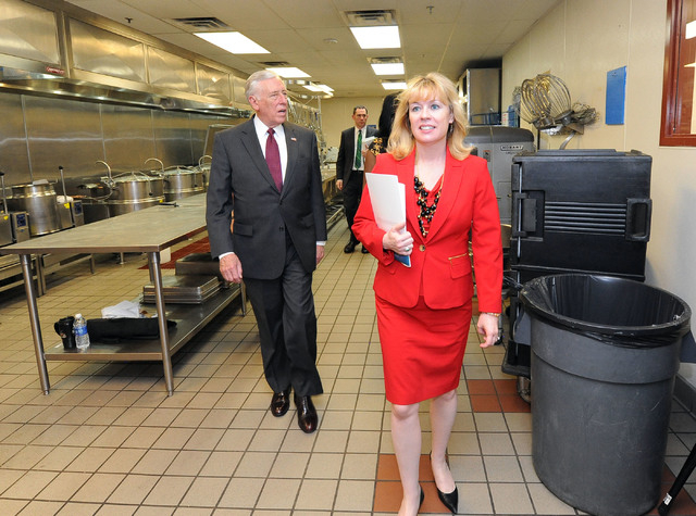 Nevada congressional candidate Erin Bilbray, right, and U.S. House minority whip Steny Hoyer, D-Md., left, tour the Culinary Training Academy in Las Vegas, Monday, April 21, 2014.  (Jerry Henkel/L ...