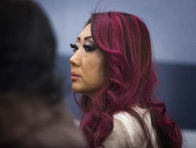Gloria Lee, 35, appears in Clark County Justice Court Wednesday, Feb. 5, 2014. She is facing charges of arson following a Jan. 27 fire at Prince and Princess Pet Boutique at 6870 S. Rainbow Road, ...