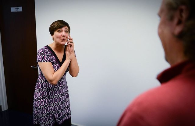Christine Alexander uses on-hold time at the incubator to walk around and be expressive to a stranger. This tactic often leads to business for HuB Studios LLC, where she freelances in client relat ...