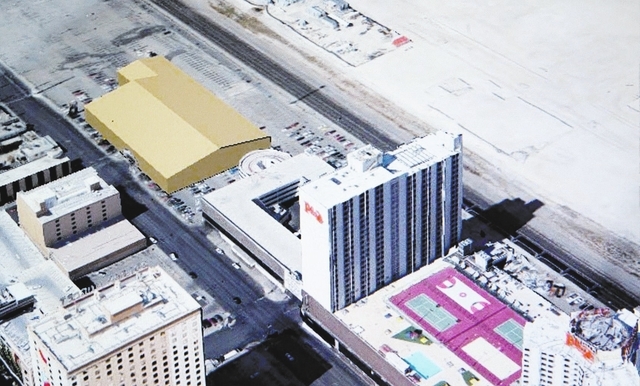 A artist rendering of the Las Vegas Wranglers arena, in yellow,  at the Plaza as seen Wednesday, April 16, 2014. The minor league hockey team submitted the revised proposal to move the facility fr ...