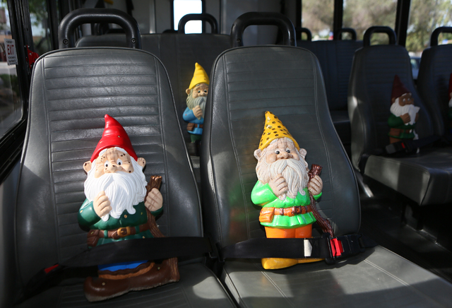 Gnomes that were made by community members at the North Las Vegas Neighborhood Recreation Center are belted into seats on the "Get Moving! Get Healthy!" bus at North Las Vegas Neighborhood Recreat ...