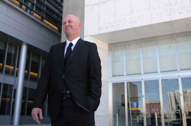 National Guard Sgt. Mark England talks to a reporter outside of Lloyd George Federal Courthouse in Las Vegas during lunch break following jury selection on his civil rights case Monday, April 14,  ...