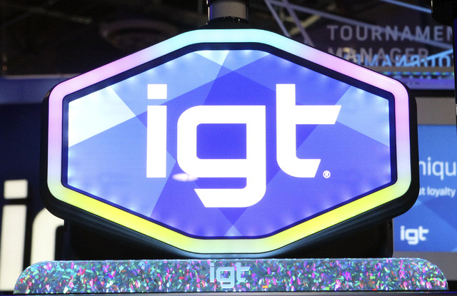 The new IGT logo is seen at the IGT booth at the G2E convention in the Sands Expo in Las Vegas, Monday, Sept. 23, 2013. G2E opens on Tuesday, Sept. 24, 2013. (Jerry Henkel/Las Vegas Review-Journal)