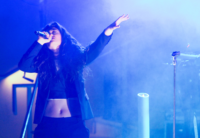 Lorde performs at the Boulevard Pool at The Cosmopolitan of Las Vegas on Tuesday, April 15, 2014. (Chase Stevens/Las Vegas Review-Journal)