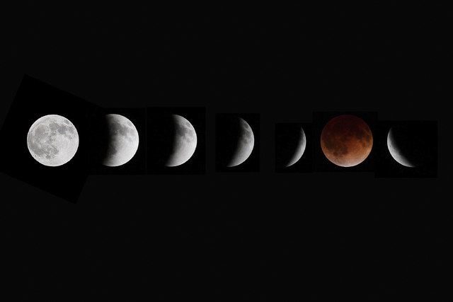This composite photo shows multiple images of the moon during the stages of a lunar eclipse, as seen from Winnipeg, Manitoba, Canada, on Tuesday, April 15, 2014. (AP Photo/The Canadian Press, John ...