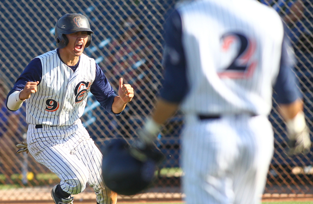 Chatsworth's Riley Conlan (9) celebrates stealing home during the sixth inning in the championship game against Basic in the Blazer  Spring Bash. Chatsworth won 5-3. (Chase Stevens/Las Vegas Revie ...