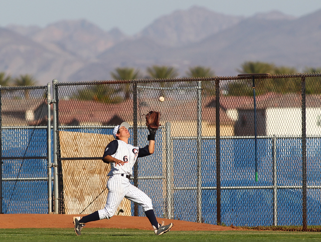 Chatsworth's Micah Ortiz (6) reaches to catch a fly ball against Basic during the sixth inning in the championship game of the Blazer Spring Bash. Chatsworth won 5-3. (Chase Stevens/Las Vegas Revi ...