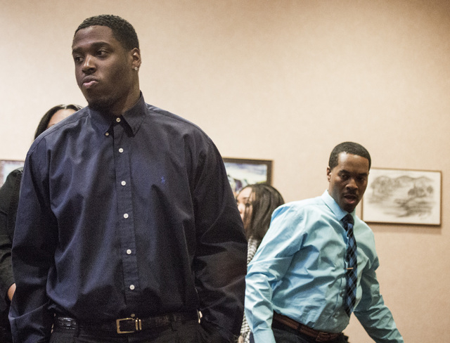 Olujuwon Bryant, 23, left, and co-defendant Deon Derrico, 43, father of the famed Las Vegas quintuplets, appear in North Las Vegas Justice Court on Wednesday, April 2, 2014. They are facing 13 fel ...