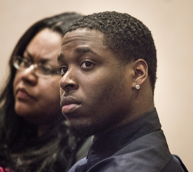 Olujuwon Bryant, 23, right, appears in North Las Vegas Justice Court on Wednesday, April 2, 2014. He appeared with co-defendant Deon Derrico, 43, father of the famed Las Vegas quintuplets. (Jeff S ...