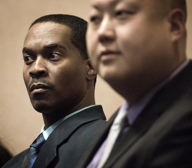 Deon Derrico, left, father of the famed Las Vegas quintuplets, appears in North Las Vegas Justice Court on Wednesday, April 2, 2014. Derrico, 43, is facing 13 felony and three gross misdemeanor ch ...