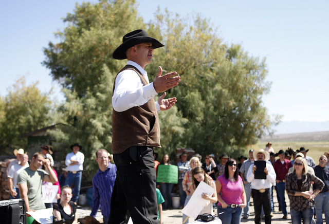 Ryan Bundy, son of Cliven Bundy, speaks during a rally near Bunkerville Nev. Monday, April 7, 2014, 2014. The Bureau of Land Management has begun to round up what they call "trespass cattle&q ...