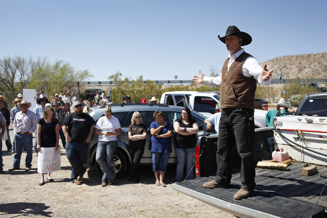 Ryan Bundy, son of Cliven Bundy, speaks during a rally near Bunkerville Nev. Monday, April 7, 2014, 2014. The Bureau of Land Management has begun to round up what they call "trespass cattle&q ...