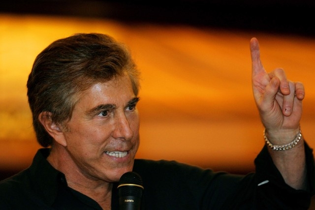 Las Vegas casino mogul Steve Wynn gestures during a news conference in this file photo.  (AP Photo/Kin Cheung)