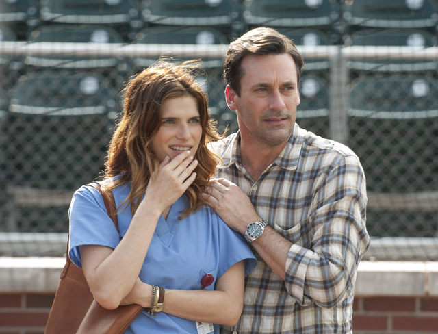 This image released by Disney shows Lake Bell, left, and Jon Hamm in a scene from the film, "Million Dollar Arm." (AP Photo/Disney, Ron Phillips)