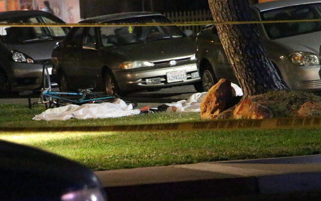 In this image provided by KEYT-TV, bodies are seen covered on the ground after a mass shooting near the campus of the University of Santa Barbara in Isla Vista, Calif., Friday, May 23, 2014. A dr ...