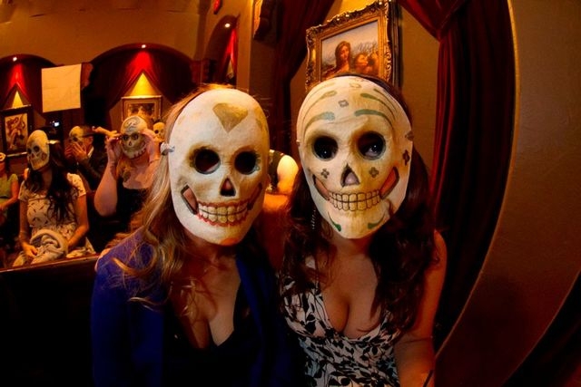 Guests pose for a photo during a Dia de los Muertos themed wedding performed by humanist celebrant Raul Martinez in Las Vegas in October 2012. (Special to View)