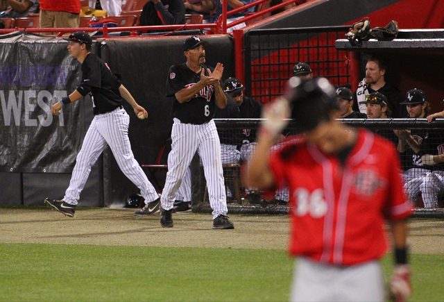 UNLV head coach Tim Chambers (6) claps after the top of the 1st inning ends with no runs scored by San Diego State during a game in the Mountain West baseball tournament at Earl E. Wilson Stadium  ...