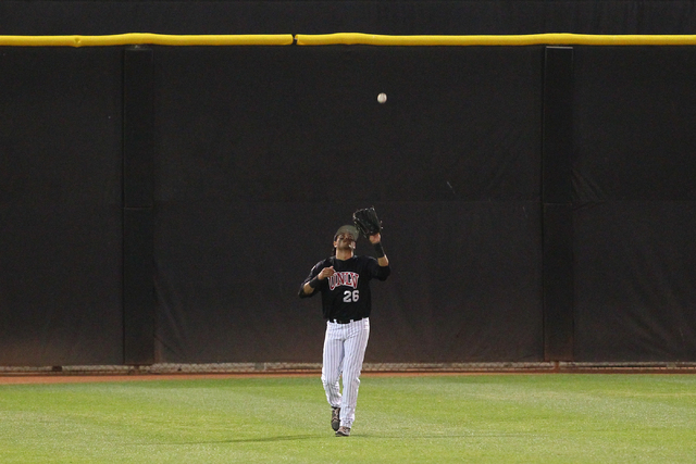 UNLV's Edgar Montes catches a fly ball from San Diego State's Ty France, not pictured, during a game in the Mountain West baseball tournament at Earl E. Wilson Stadium in Las Vegas on Friday, May  ...