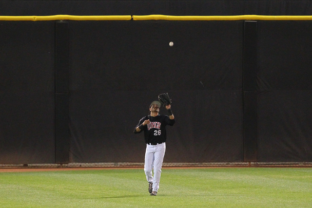 UNLV's Edgar Montes catches a fly ball from San Diego State's Ty France, not pictured, during a game in the Mountain West baseball tournament at Earl E. Wilson Stadium in Las Vegas on Friday, May ...