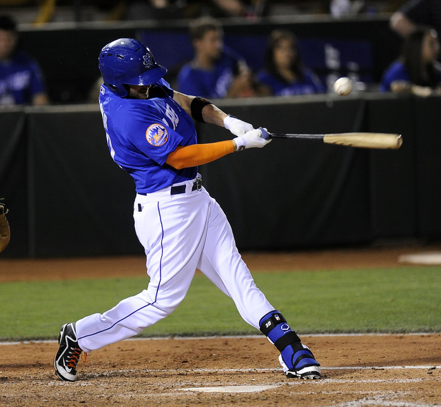 Las Vegas 51s right fielder Andrew Brown hits a double in the sixth inning of a Triple-A minor league baseball game against the Sacramento River Cats at Cashman Field in Las Vegas Friday, May 23,  ...