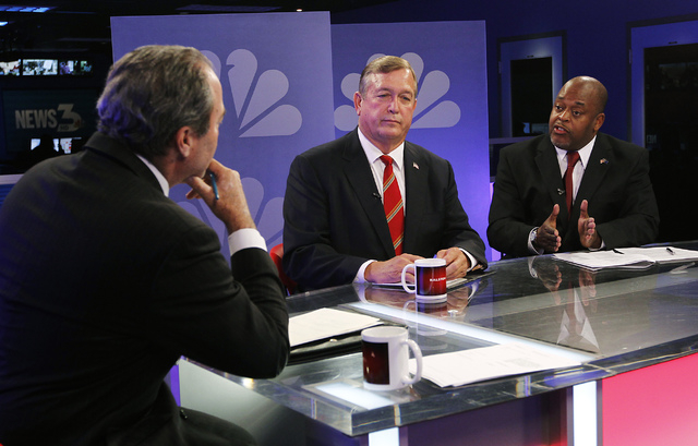 Nevada 4th Congressional District candidates Republican Assemblyman Cresent Hardy, middle, and his GOP rival Niger Innis, right, debate for the fourth and final time during the Ralston Reports new ...