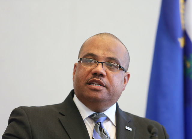Ronald Davis, director of the Office of Community Oriented Policing Services (COPS), speaks during a news conference at the Lloyd D. George U.S. Courthouse Wednesday, May 21, 2014, in Las Vegas. C ...