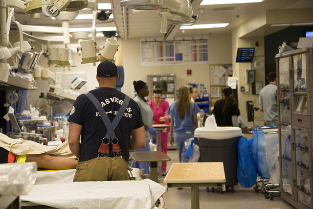 An emergency patient is brought by the Las Vegas Fire & Rescue team to the University Medical Center Trauma Center in Las Vegas on Saturday, May 10, 2014. (Jeferson Applegate/Las Vegas Review-Journal)